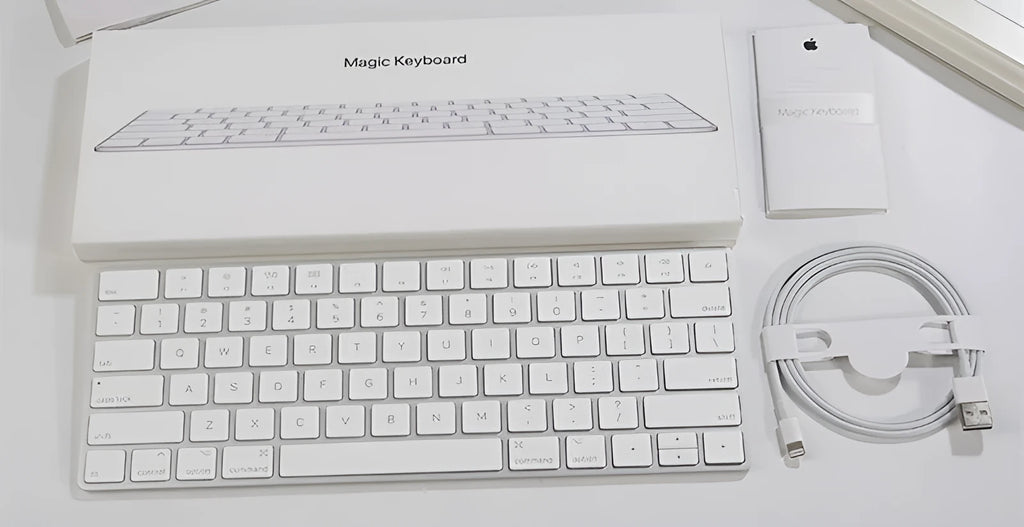 Apple white Bluetooth wireless keyboard with metal construction and multimedia keys