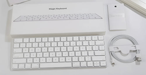 Apple white Bluetooth wireless keyboard with metal construction and multimedia keys