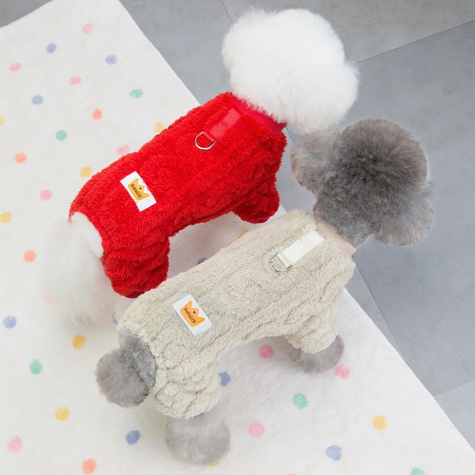 Four-legged dog fleece jacket in khaki on a small breed dog outdoors