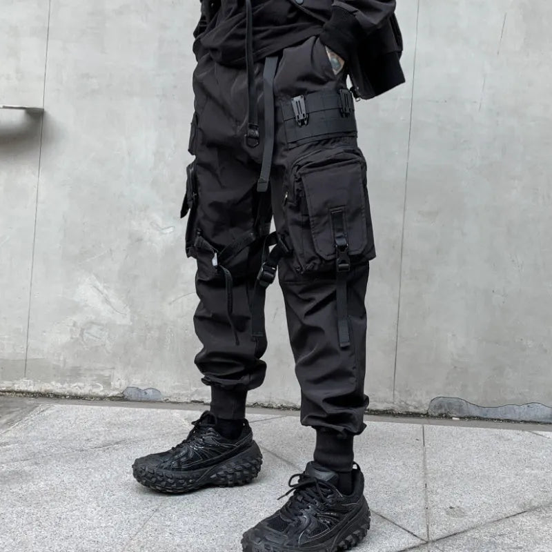 Men's black casual overalls loose fit binding hem trousers front view on mannequin
