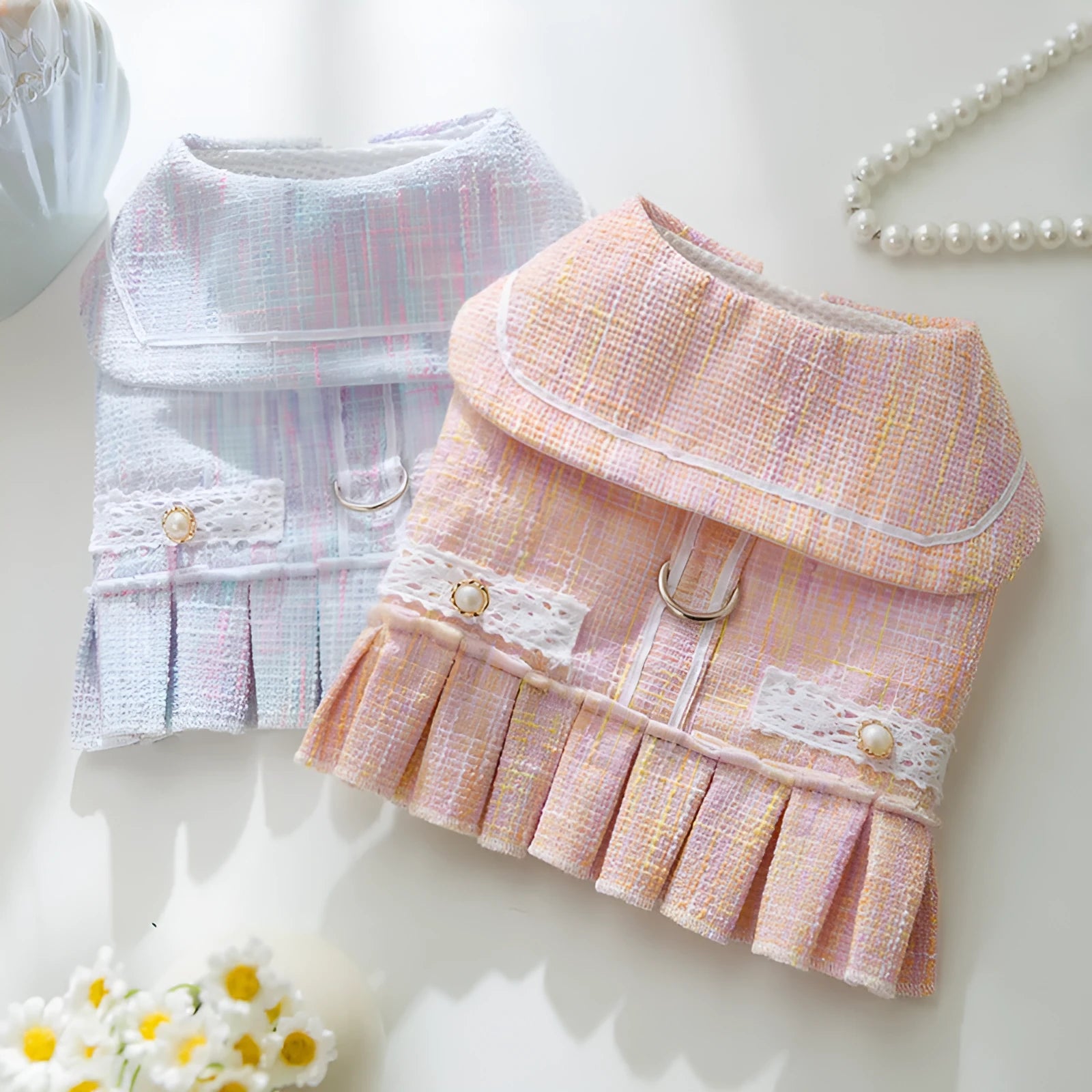 Purple and pink polyester jumper pet clothing for small dogs and cats, shown in sizes S, M, L, XL.
