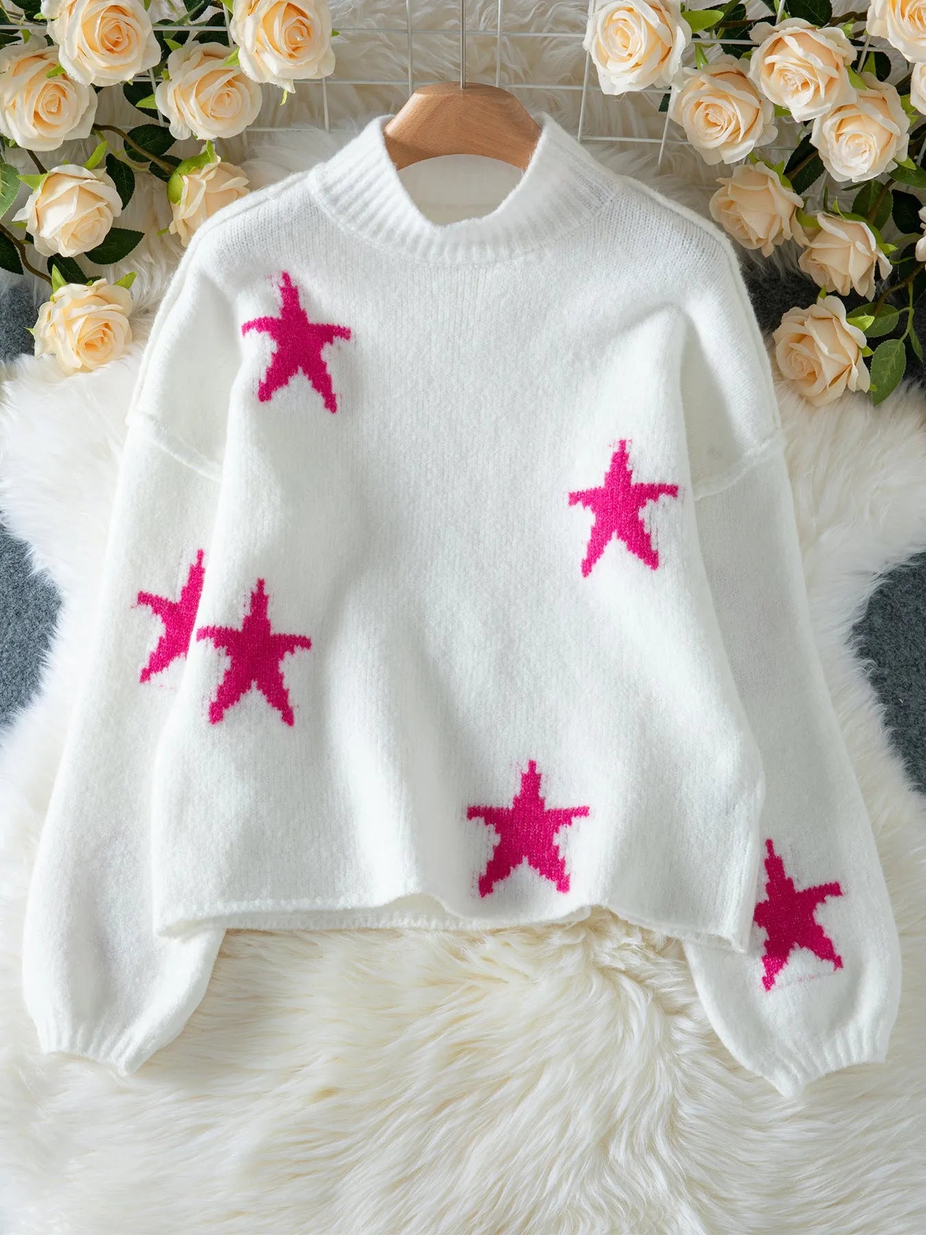 White women's loose turtleneck pullover sweater with five-pointed star pattern and contrast detailing