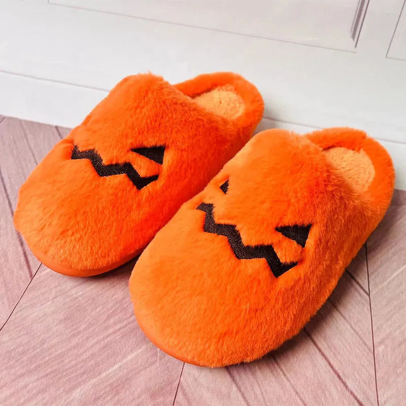Orange Halloween pumpkin slippers with plush lining and textured coral velvet uppers