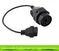 OBD2 BMW 20 pin to 16 pin diagnostic connector adapter cable isolated on white background.