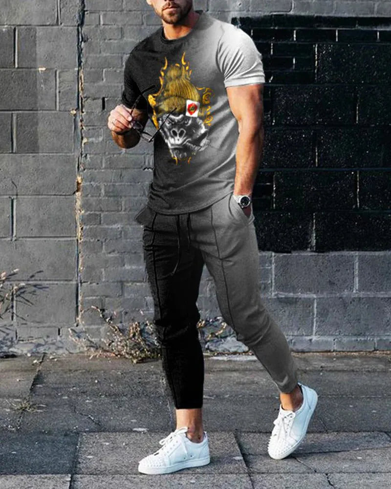 Men's short sleeve round neck T-shirt and matching trousers set in a light grey colour.