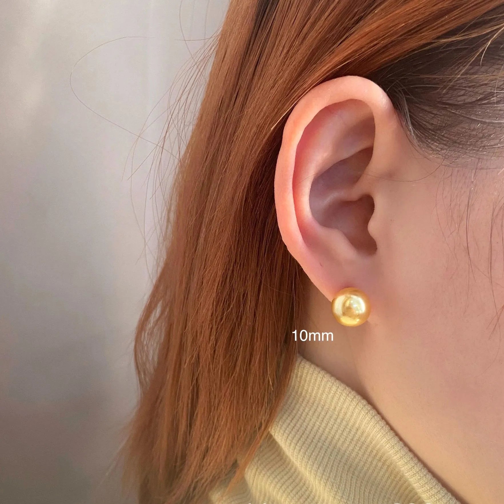 Geometric pearl stud earrings with retro styling in silver with eight-point star details