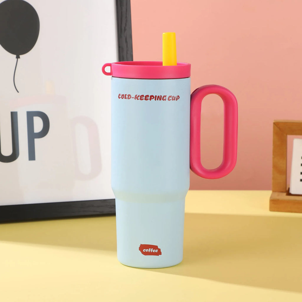 Large insulated plastic straw cup with a carry handle and lid, shown in assorted colours.