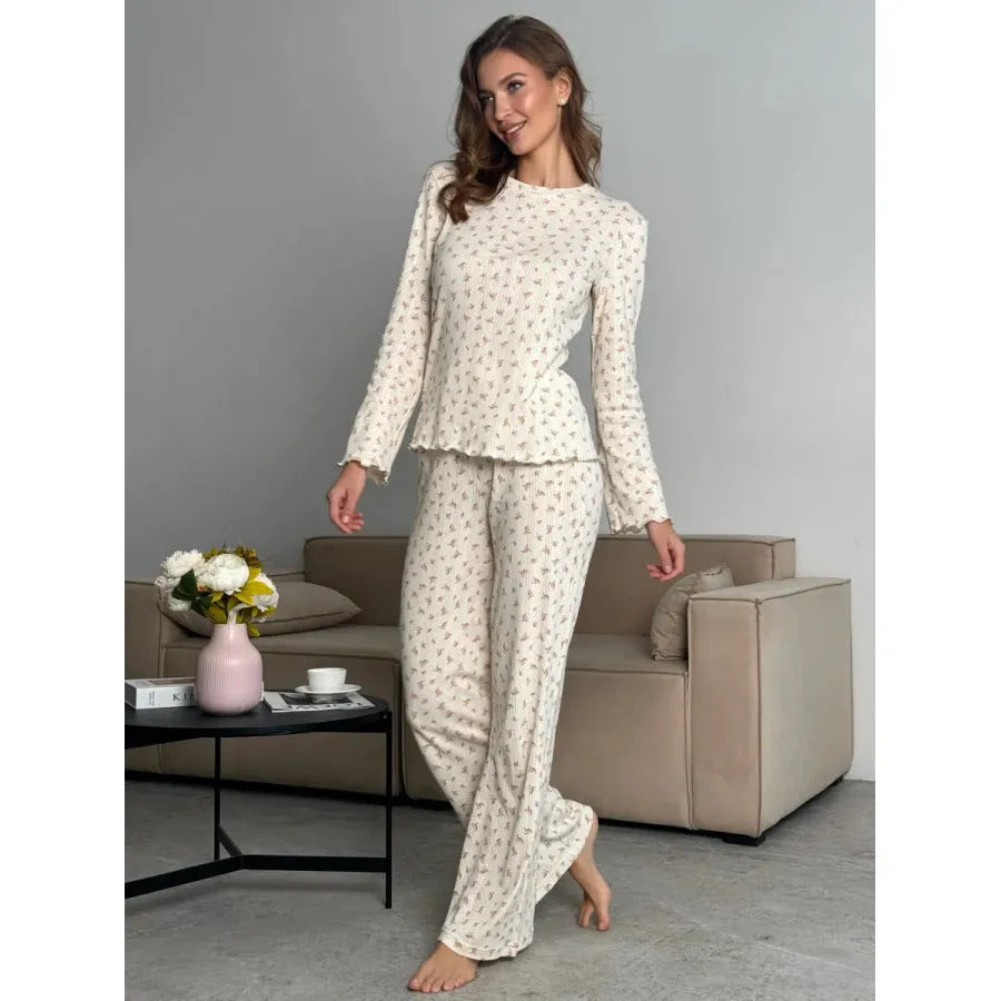 White floral print women's lounge suit with bell sleeve top and wide leg trousers