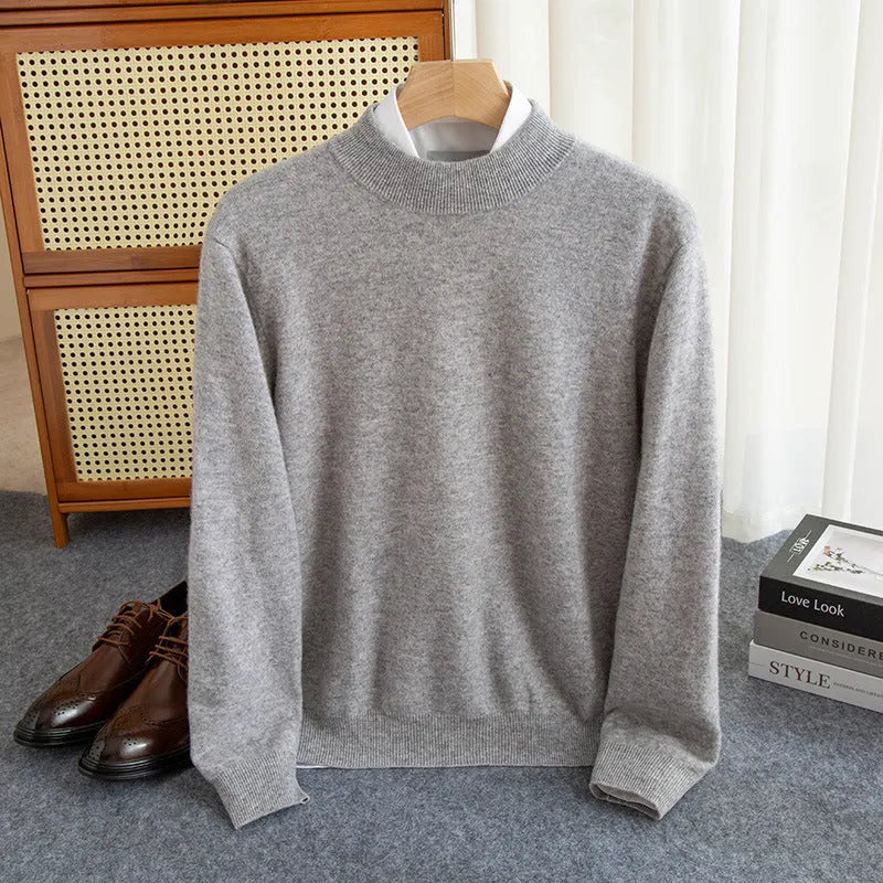 Man wearing a loose-fit half-collar wool sweater in a camel colour, suitable for winter casual wear.