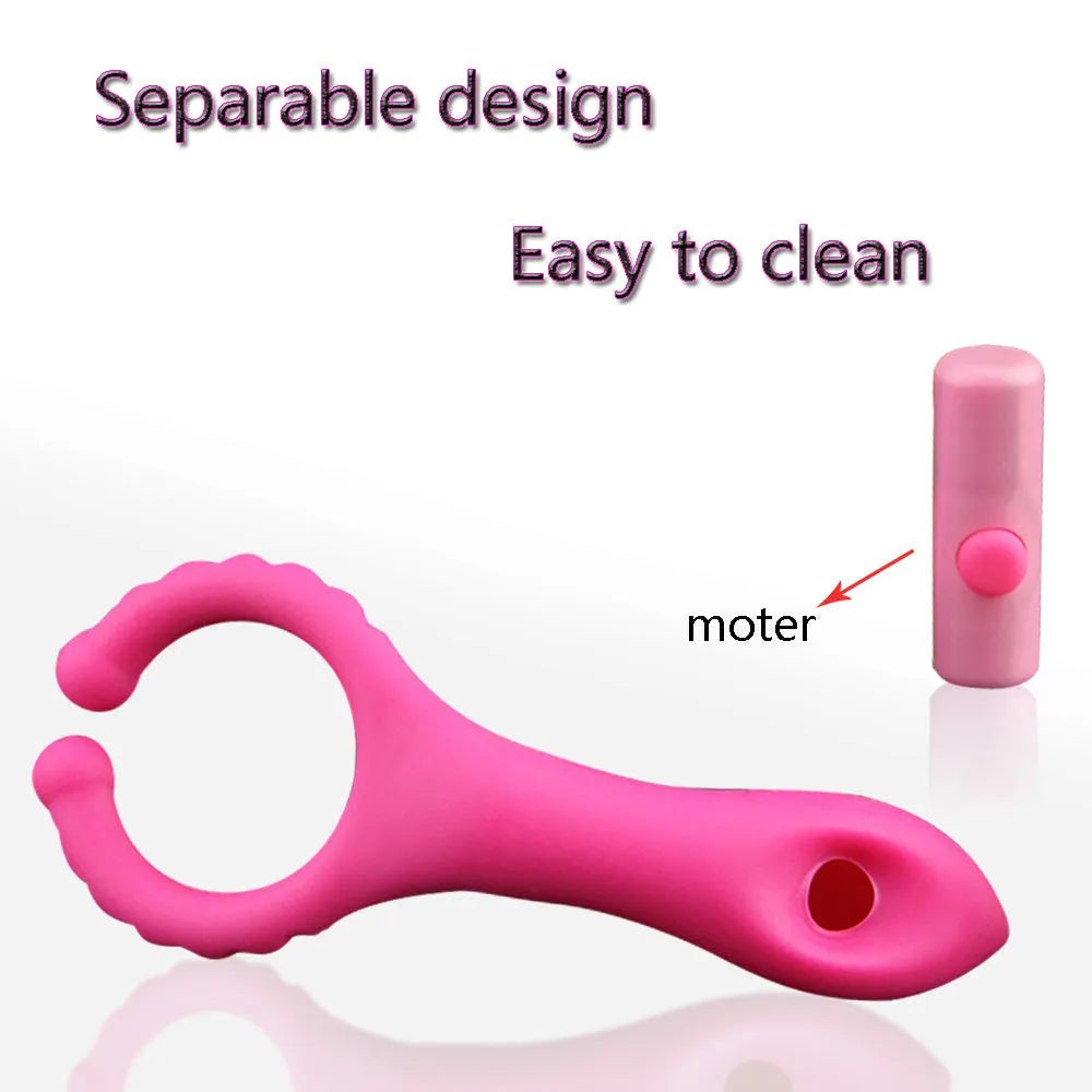 Seismic Clip silicone vibrating clitoral stimulator in rose red, 103mm long, lying flat on a clean surface