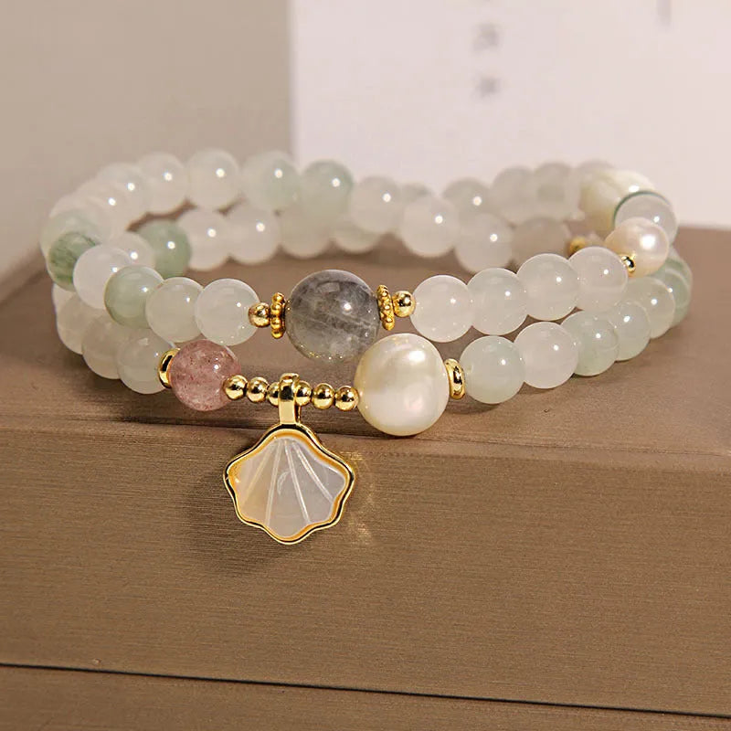 Tianshan emerald green crystal bracelet with gold-plated ginkgo leaf pendant and rhinestone details
