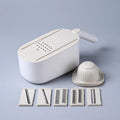 Multifunctional vegetable cutter in Nordic style with stainless steel blades, available in blue, grey, and khaki colours