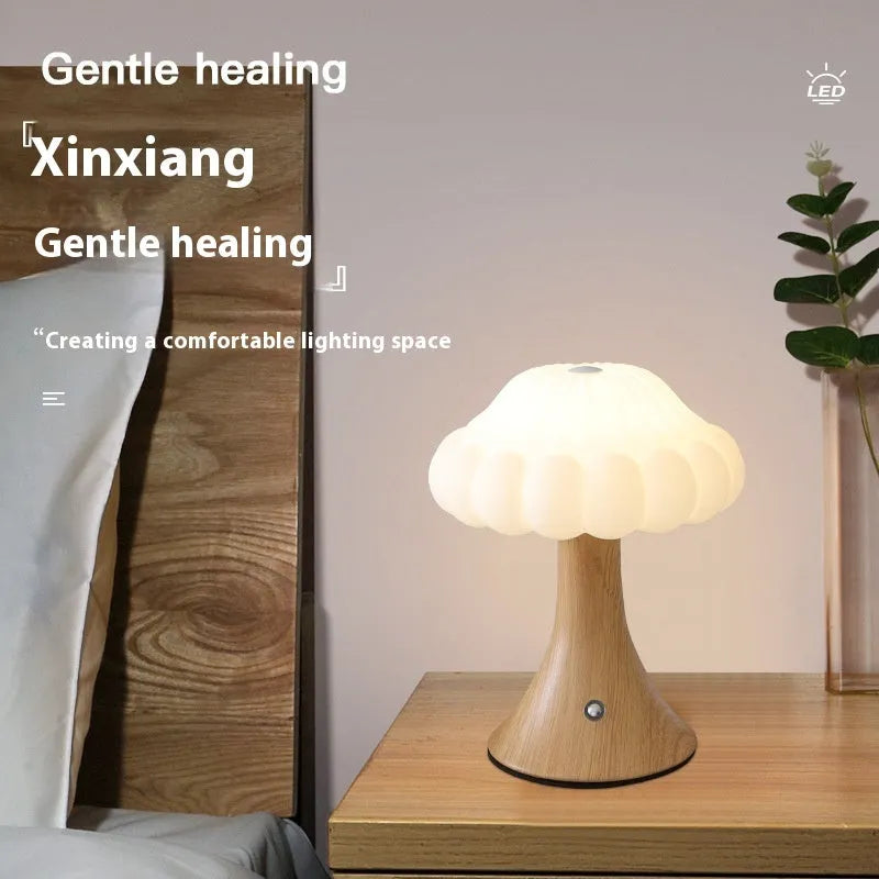 Mushroom-shaped night light with touch controls and USB port in wood grain finish