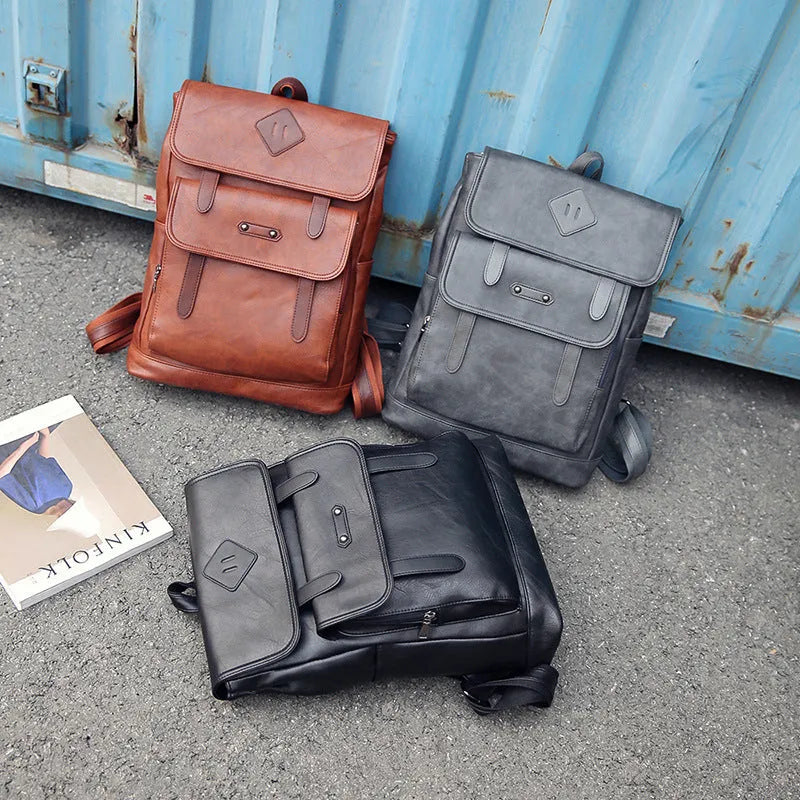 Gray leather retro laptop backpack for men with compact 30cm by 20cm by 10cm dimensions