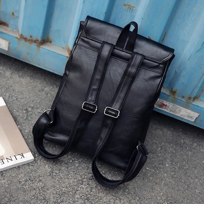 Gray leather retro laptop backpack for men with compact 30cm by 20cm by 10cm dimensions