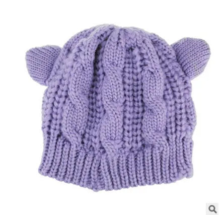 Hand made knitted cat ear beanie in winter colours with 3D design