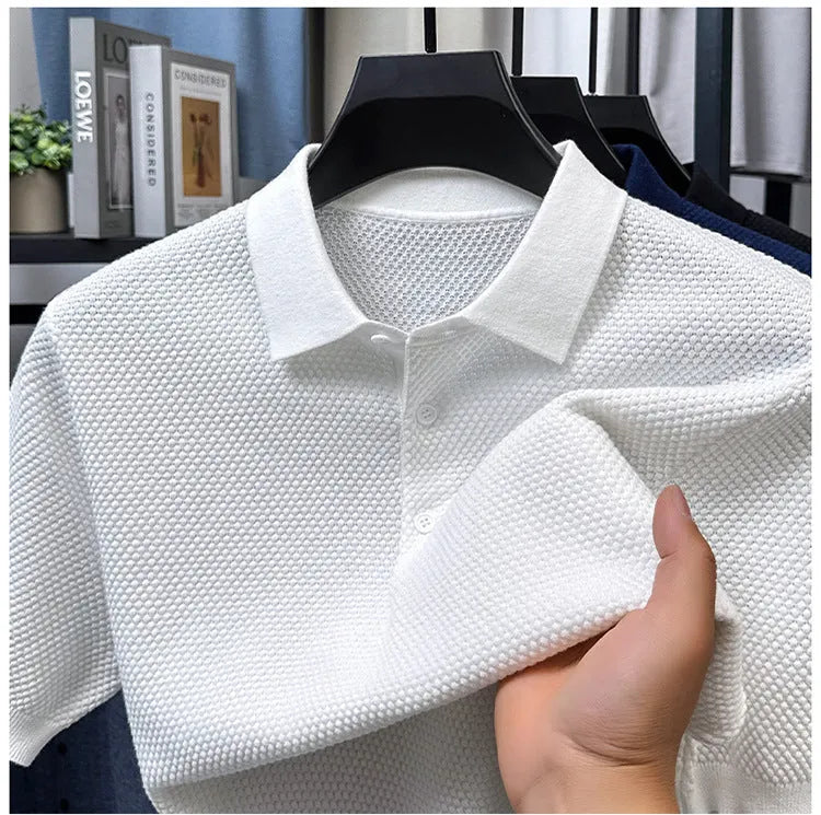 Loose fit pure cotton short sleeve pullover sweater shown in various colours including grey and navy.