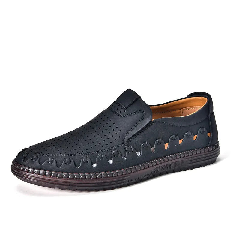 Men's brown slip-on casual shoes with round toe and flat heel on a white background
