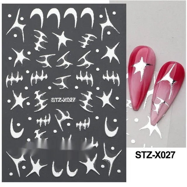 Pack of black and silver strip nail art stickers with cartoon and love pattern designs.