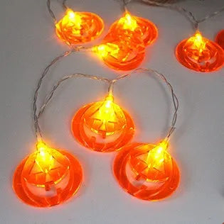 Halloween LED string lights with pumpkin, bat and ghost decorations showing colour changing illumination