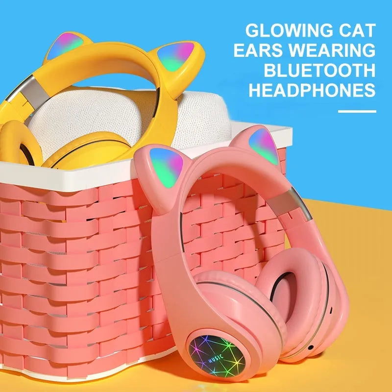 Cat ear style wireless Bluetooth sports headset shown in multiple colours on a person's head