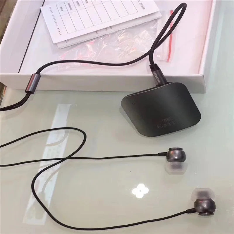 Black Bluetooth audio receiver with lavalier headset for wireless running headphones