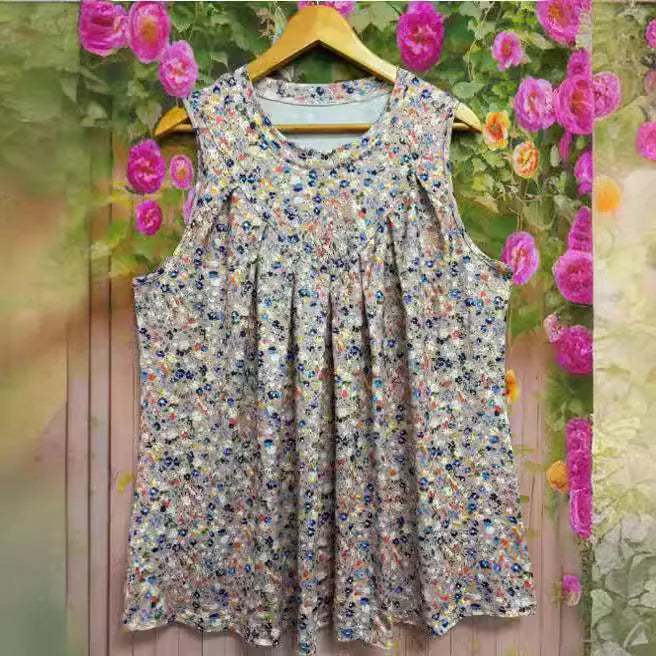 Plus size women's sleeveless vest with floral print in black or khaki colours
