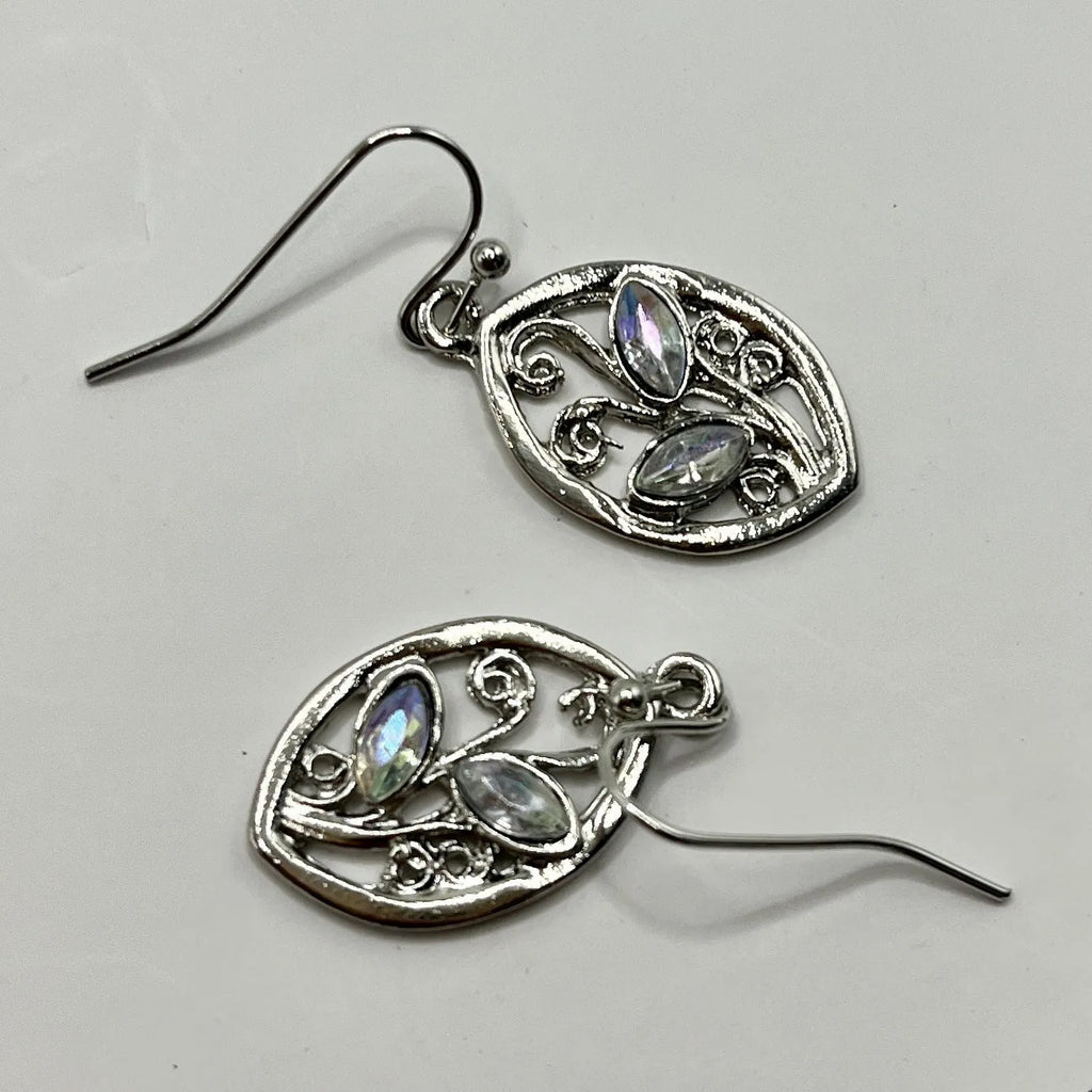 Silver-coloured alloy earrings shaped like a leaf with colourful moonstone stones embedded in the design.