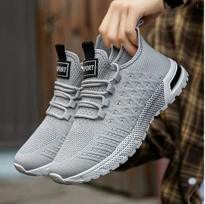 Men's mesh casual shoes in army green colour showing solid colour design and casual styling