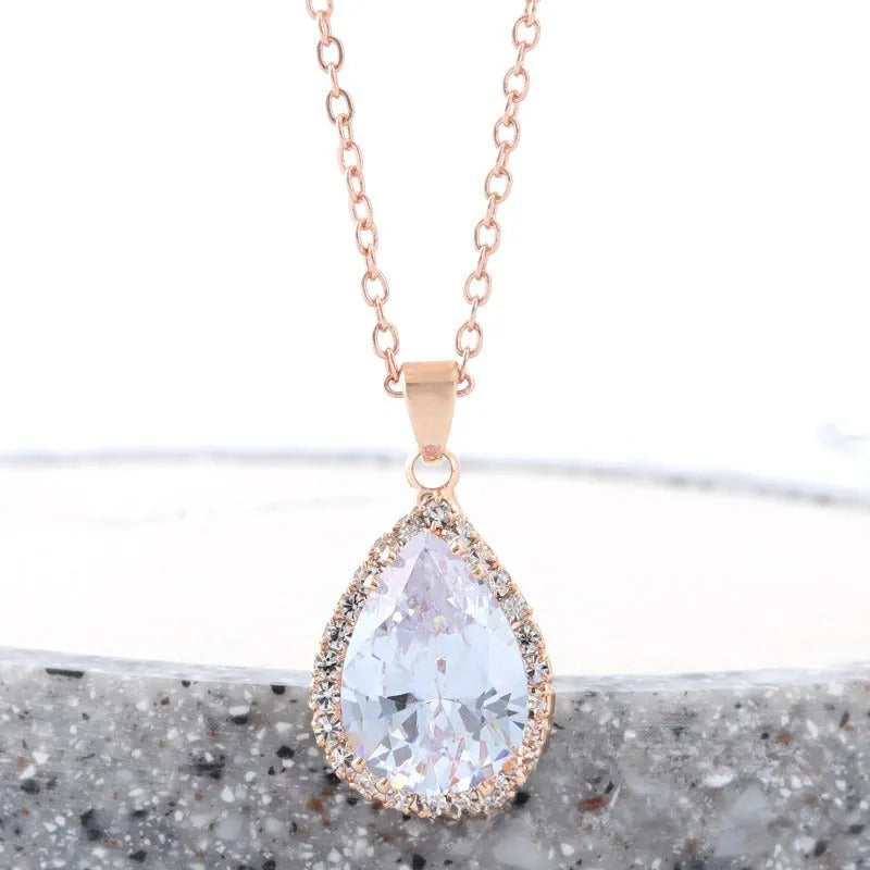 Rose gold geometric drop shape necklace with rhinestones in pink colour option