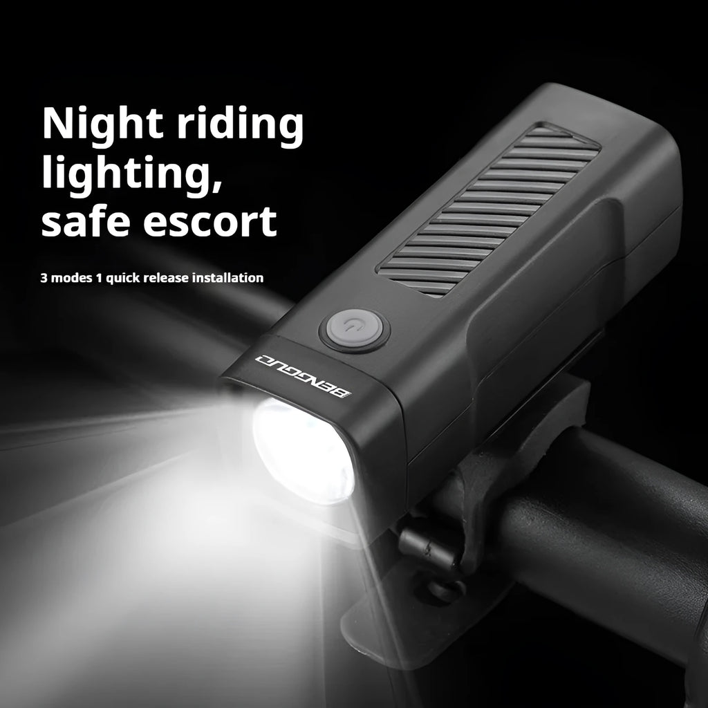 Black USB rechargeable bicycle headlight with quick-release strap mount on handlebars