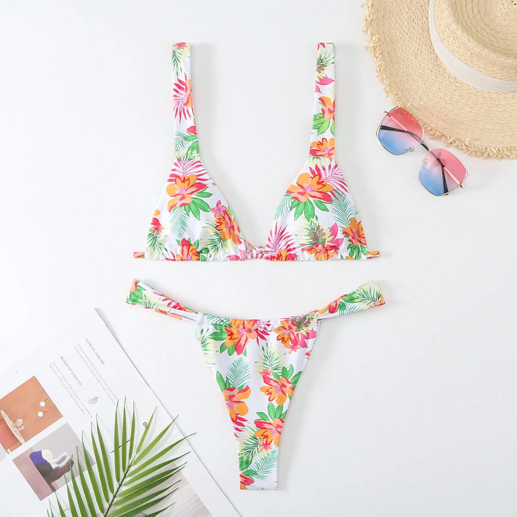 Women's floral print polyester bikini swimsuit in rose red, white, blue, or sky blue with adjustable bra