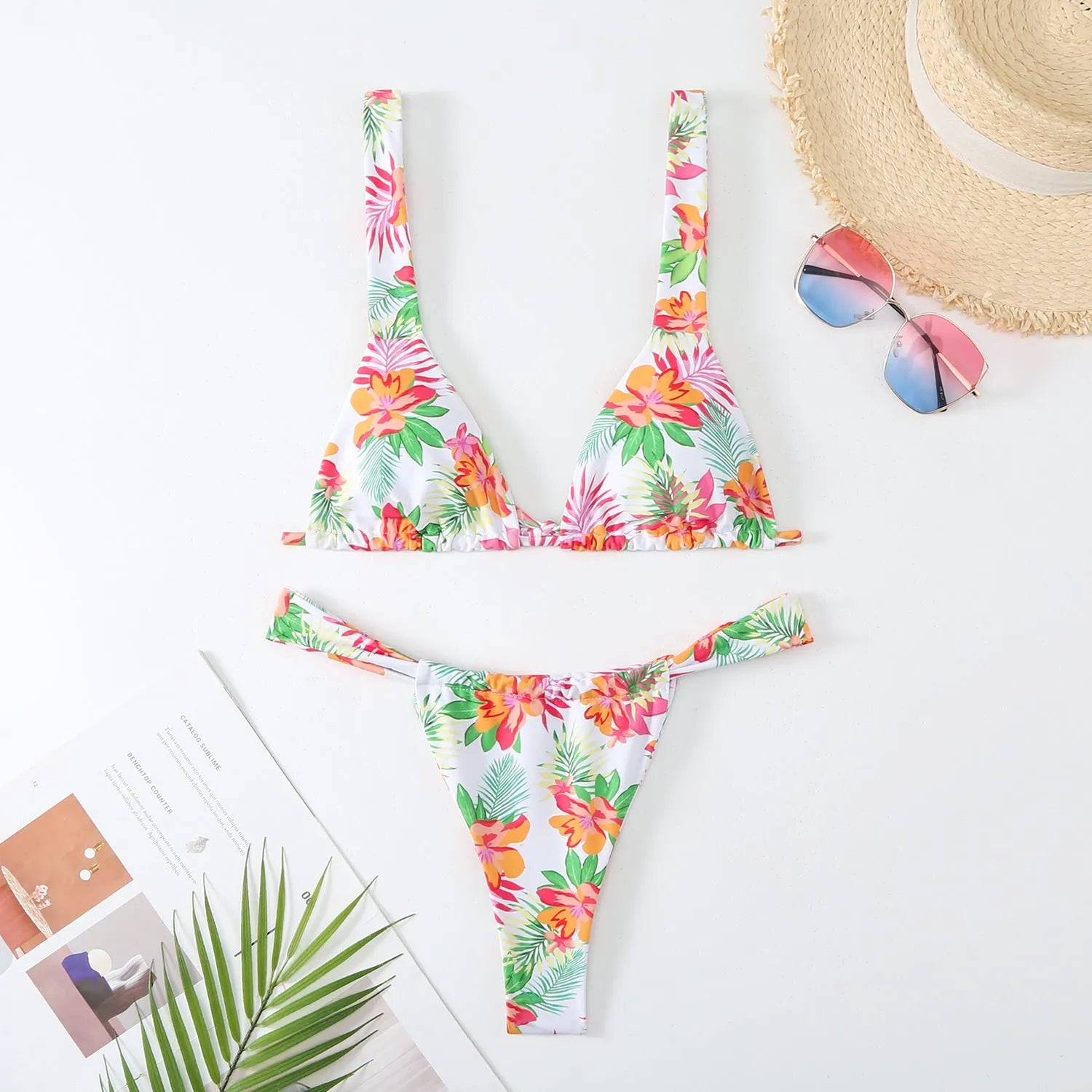 Women's floral print polyester bikini swimsuit in rose red, white, blue, or sky blue with adjustable bra