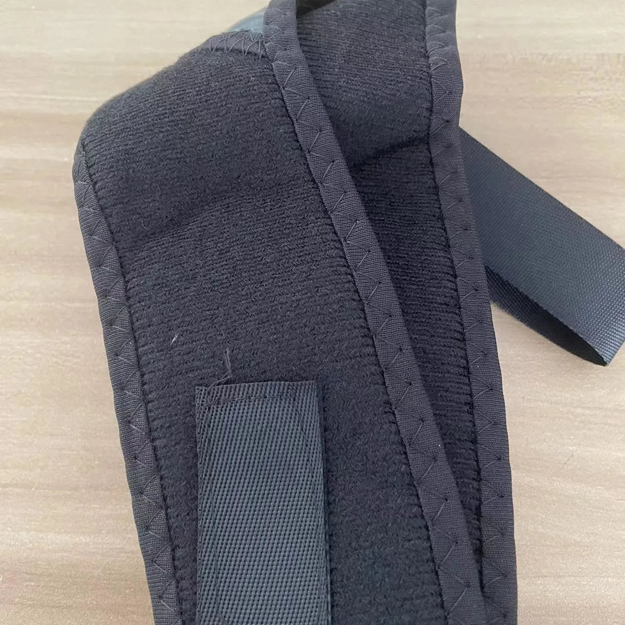 Babaka brand adjustable nylon posture correction band for back support.