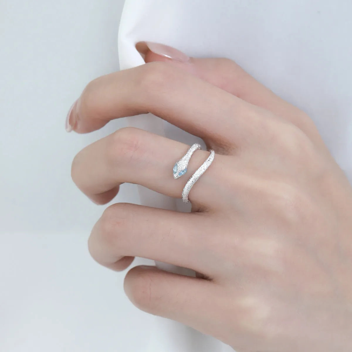 Women's adjustable silver snake ring with electroplated white gold colour finish and original zodiac animal design