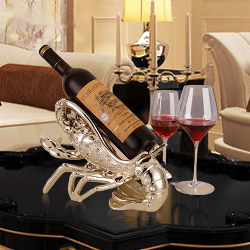 Lobster-shaped wine rack ornament in rose gold or elegant silver finish holding wine bottle