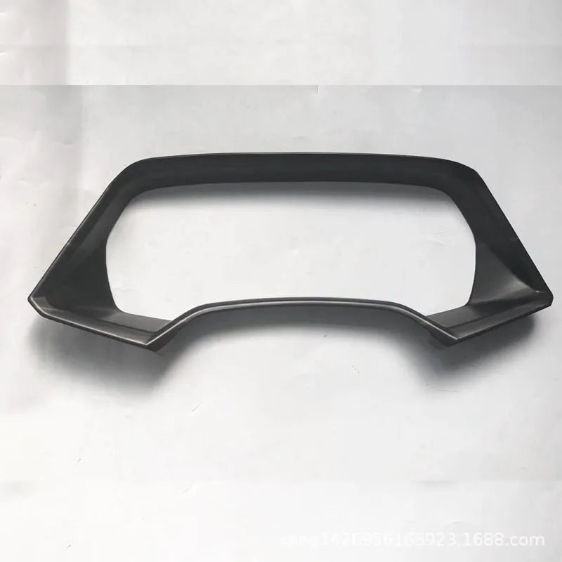 BMW X5 dashboard decorative frame in carbon fibre or peach wood finish with adhesive backing