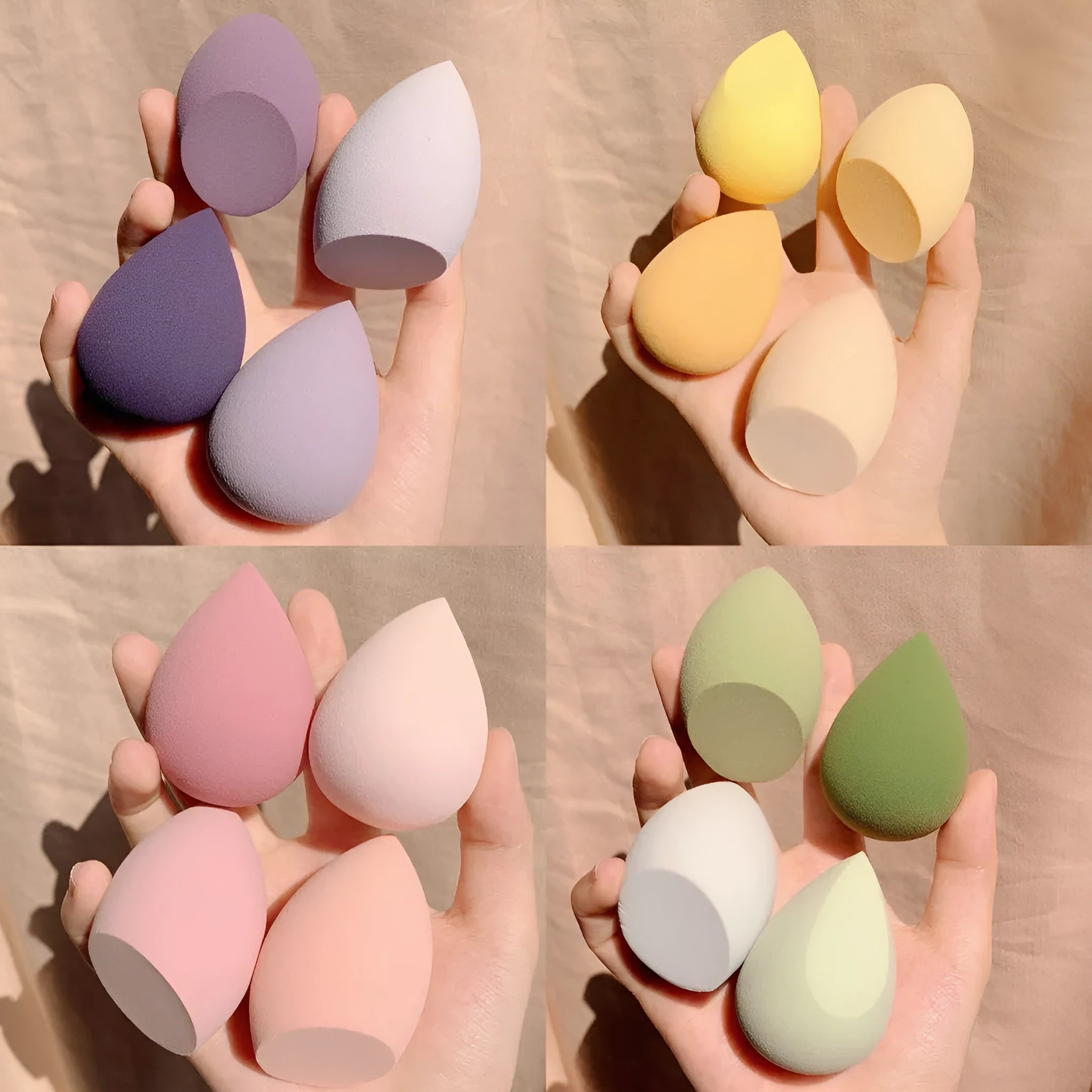 Four egg-shaped makeup sponges in grape, mango, mint, and peach colours arranged together