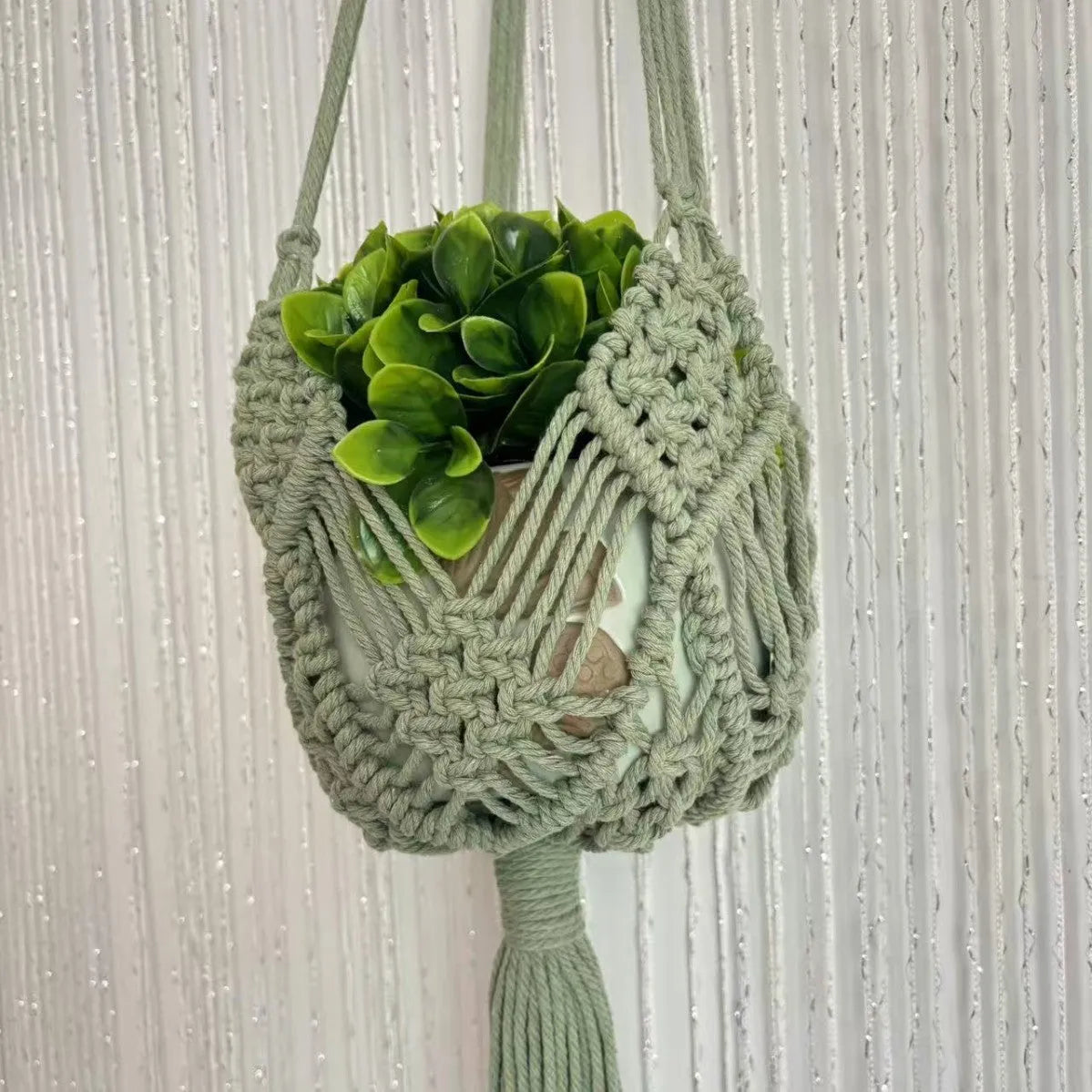 Hand-woven minimalist flower pot in polyester cotton fabric shown in brown colour