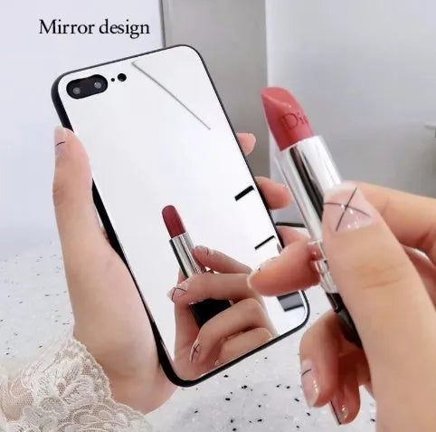 Black iPhone case with a built-in mirror on the back, compatible with iPhone X and iPhone 7 Plus models.