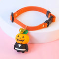 Halloween dog collar with pumpkin man and glow-in-the-dark skull designs in adjustable sizes.