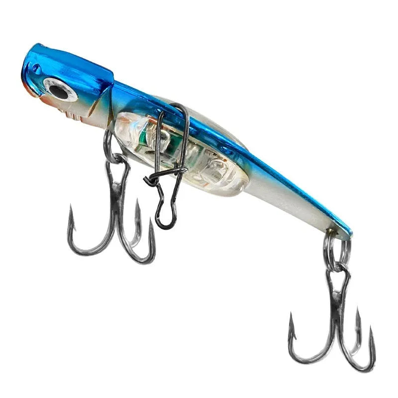 Electronic metal vib fishing lure with luminous elements in blue and red body colours