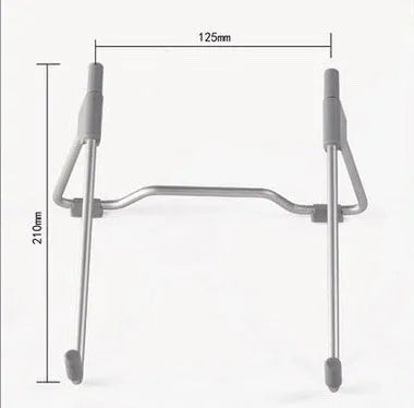 Grey aluminium alloy and plastic mobile phone and laptop stand on a wooden desk.