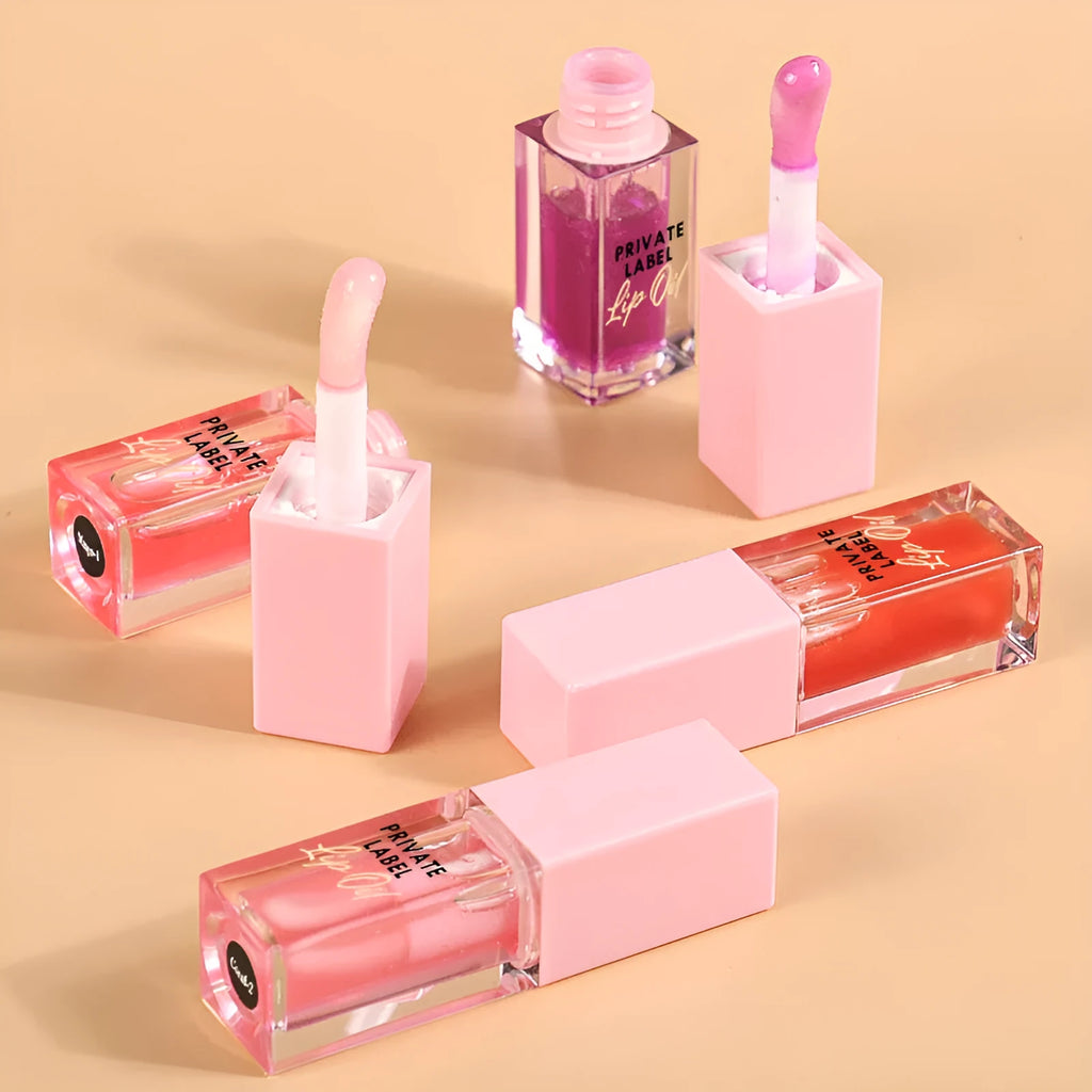 Women's transparent lip gloss set showing six 6ml tubes in bird of paradise, cherry, coral, mango, strawberry and watermelon shades