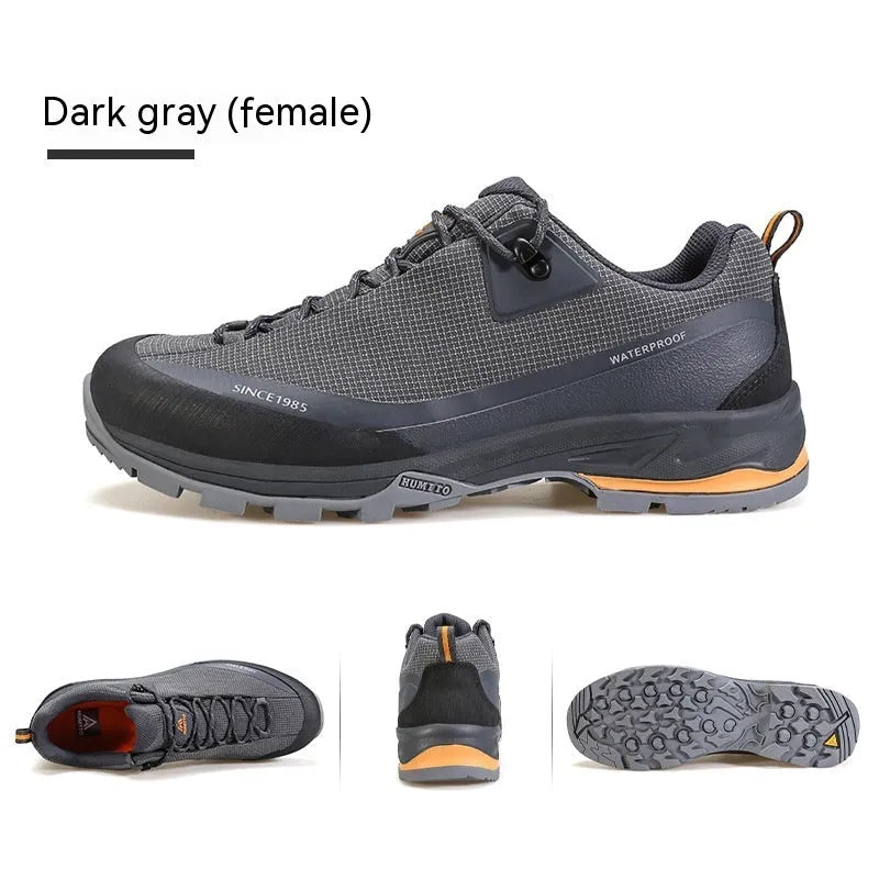 Men's low-top mountain climbing shoes with leather mesh upper and non-slip rubber outsole in black colour