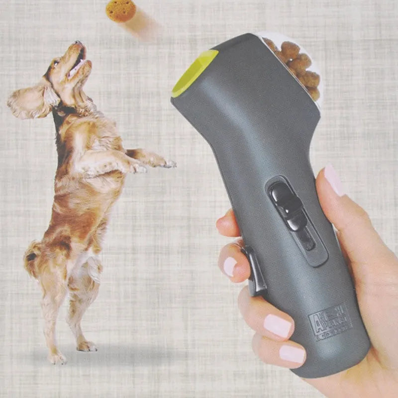 Grey pet snack launcher toy measuring 18cm with spring trigger mechanism for 2-3 metre treat launching