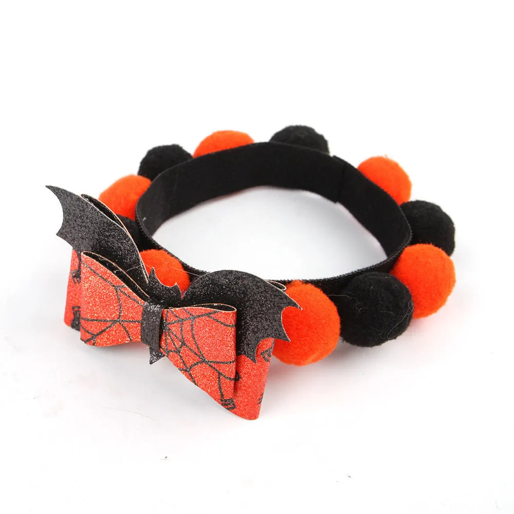 Halloween pet fur ball collar in six designs including pumpkin, skull, and witch themes
