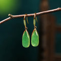Retro Chinese banquet geometric earrings with jade colour water droplet design