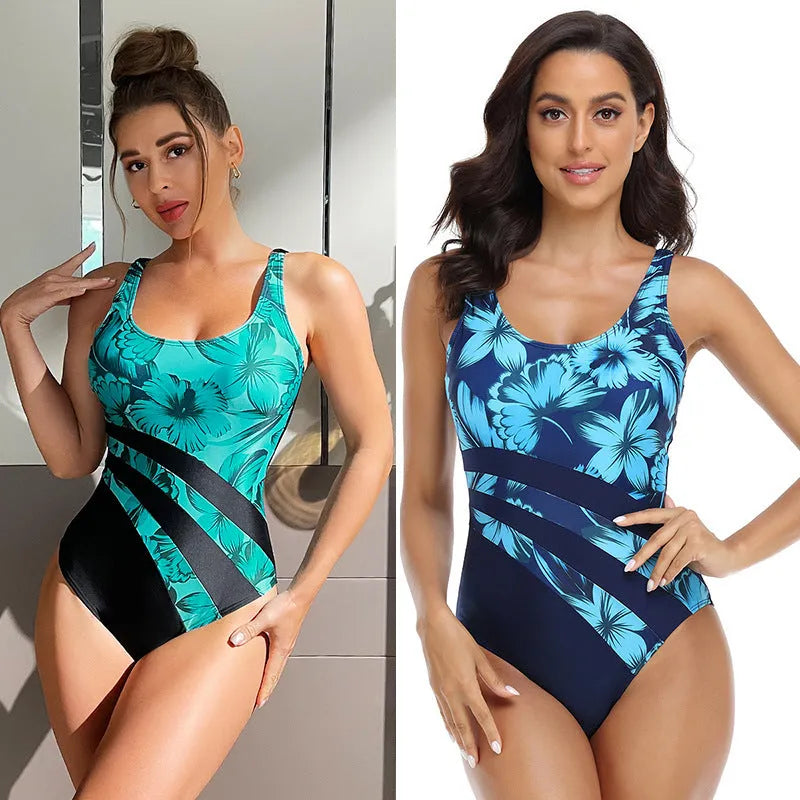 Conservative women's one-piece swimsuit with fresh printed pattern in blue or green colour options