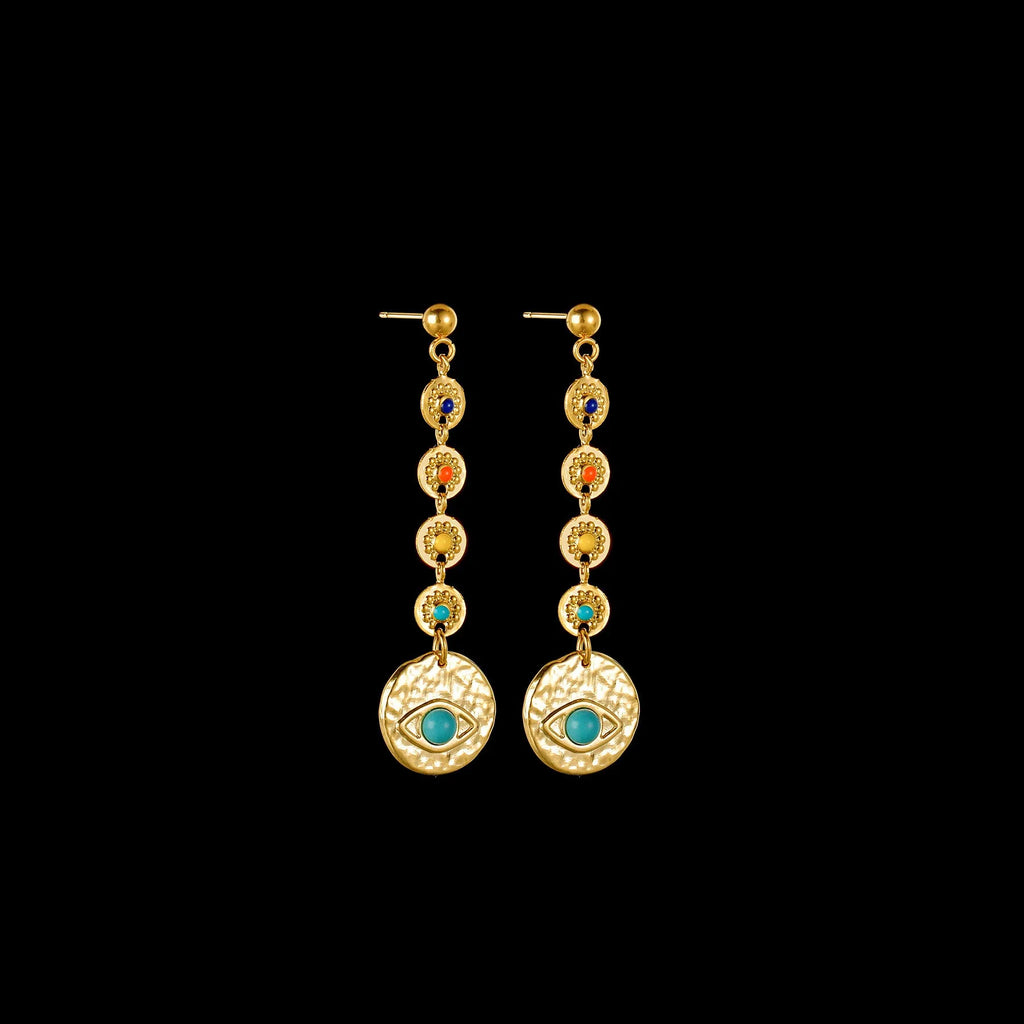 A pair of geometric stainless steel earrings on a plain background.